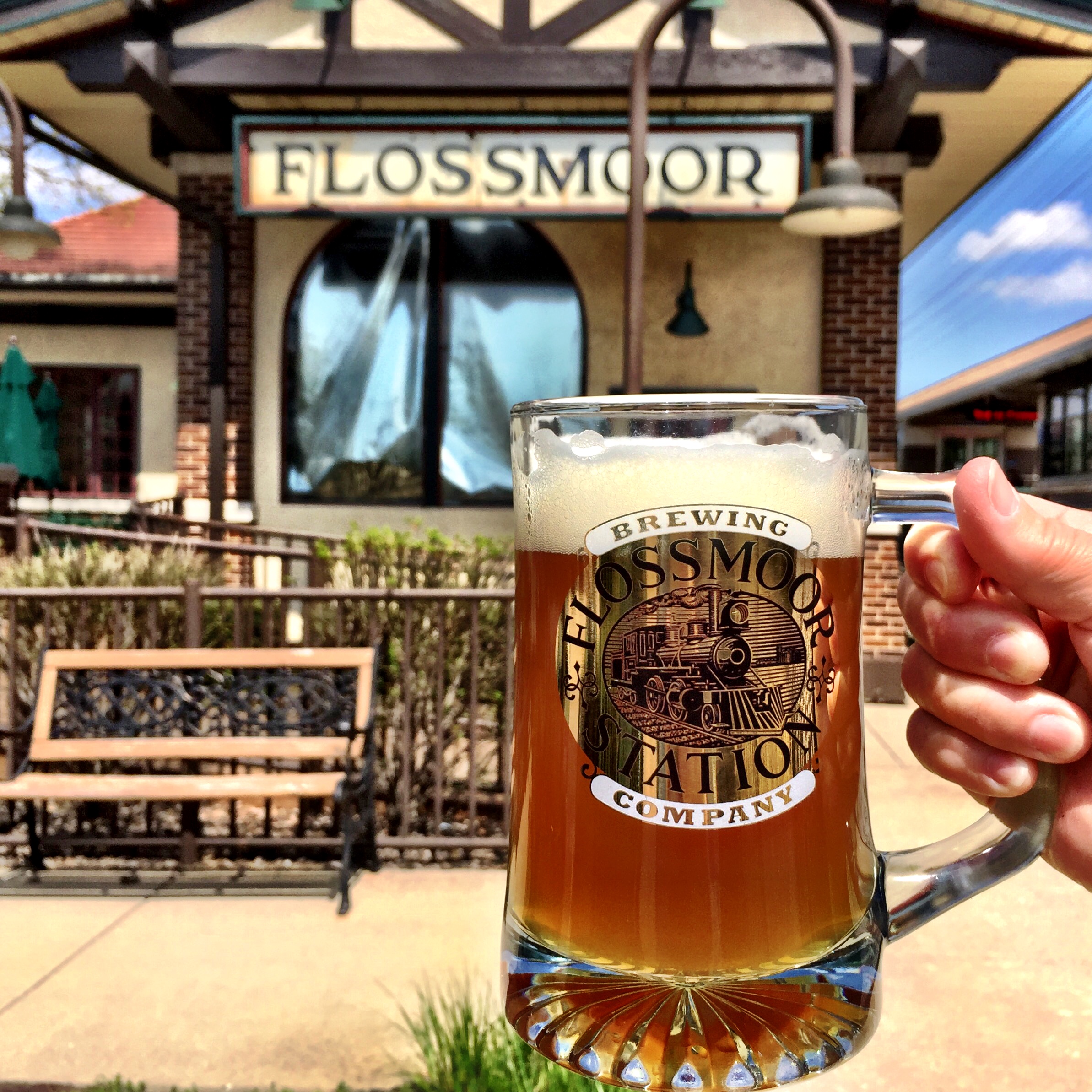 mug of beerwith Flossmoor Sation Restaurant and Brewery logo 